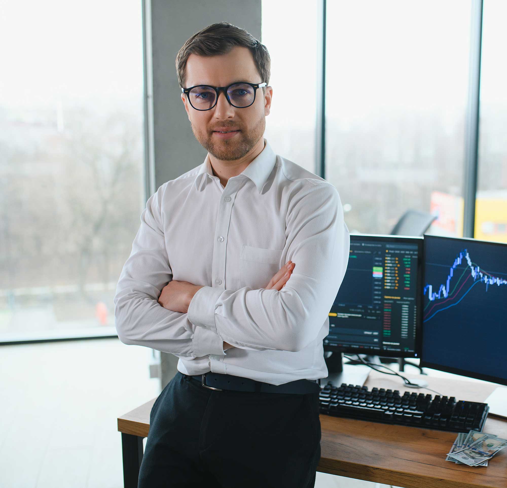 man-trader-in-formalwear-sitting-at-desk-in-frot-o-2023-11-29-23-56-00-utc.jpg
